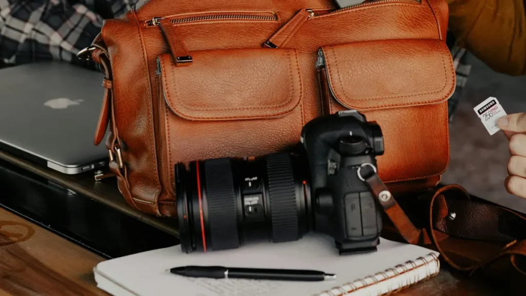 a traveler bringing cameras on planes in a bag